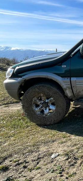 Our 4x4 Camper driving through the rugged terrains of Albania in a camping adventure
