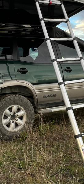 Our 4x4 Camper with the camping equipment in use in the mountains of Albania
