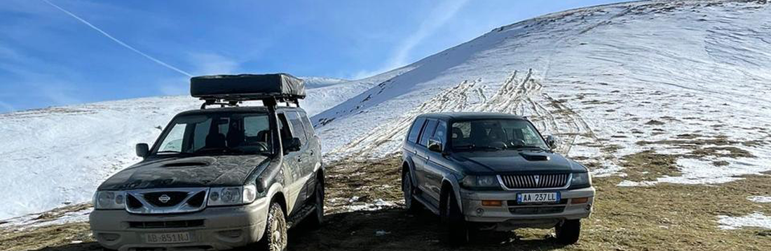 Off-Road 4x4 Campers camping in the snowy mountains of Albania. 